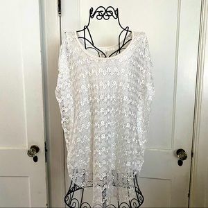 Charming lace covered, satin lined blouse